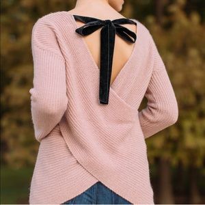 Francesca’s pink wrap sweater